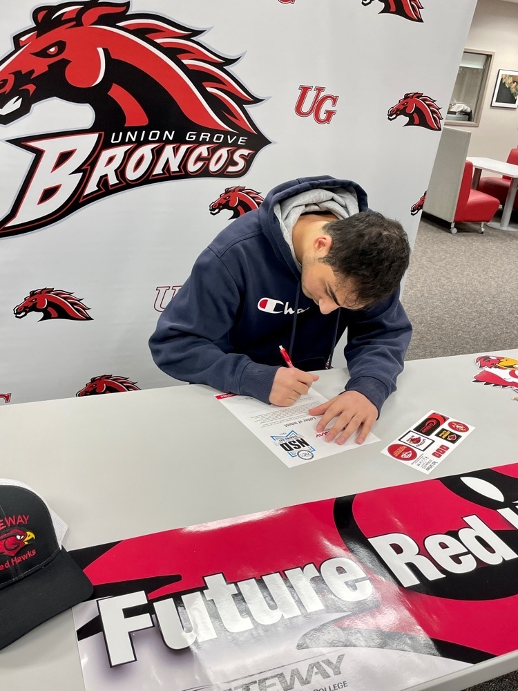 student signing