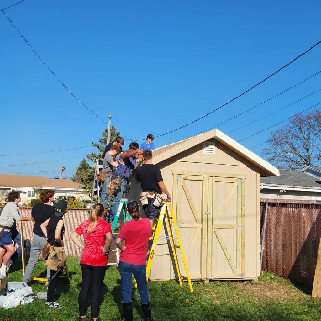 students building a shed