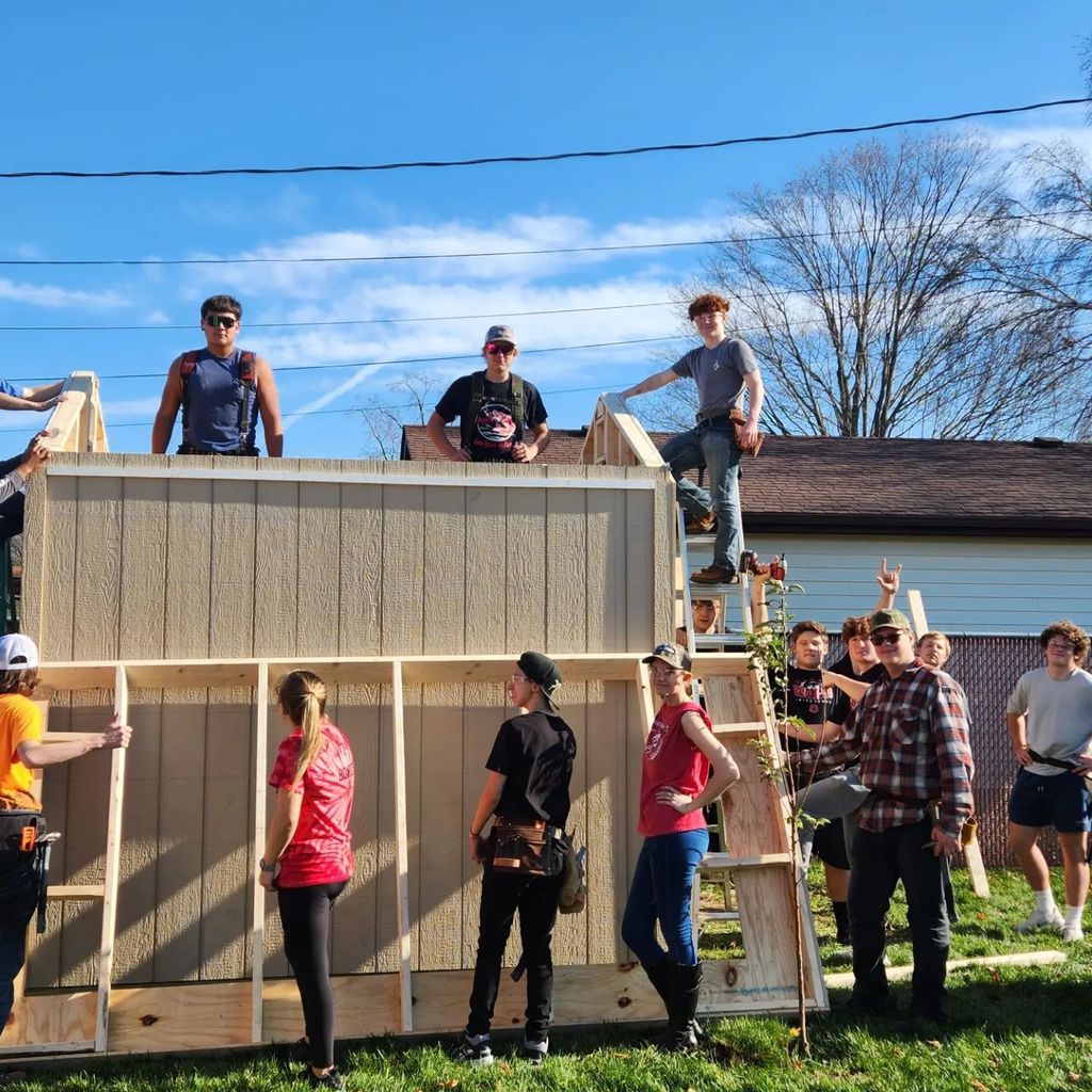 students building a shed