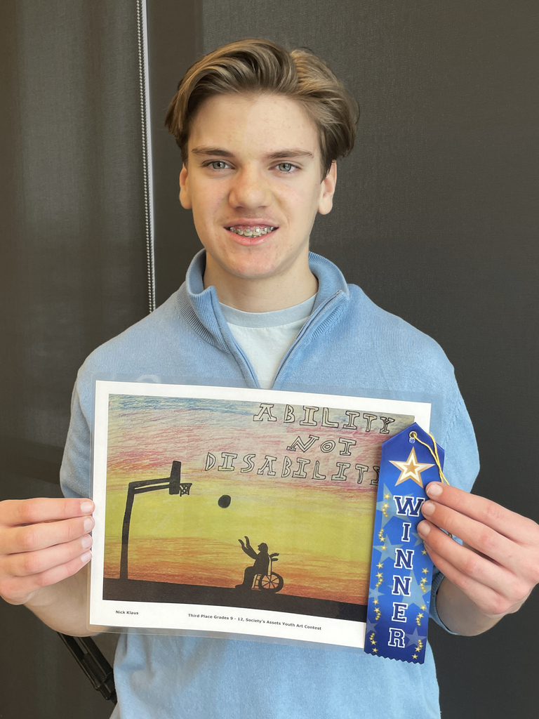 student with winning artwork